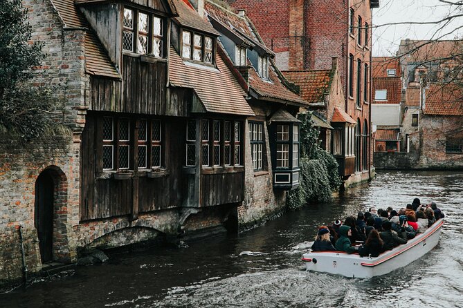 2-Hour Historical Walking Tour in Bruges with Praline Included - Sint-Janskaai, De Halve Maan, and Huidenvettersplein along the water