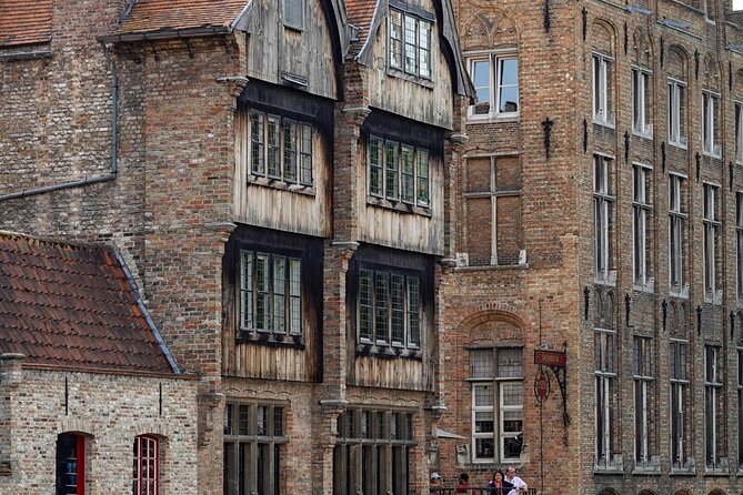 2-Hour Historical Walking Tour in Bruges with Praline Included - Ending back at Burg Square: town hall, blood chapel, and courthouse power