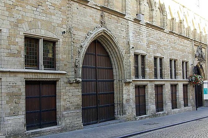 600 Years of History and Heritage: A Self-Guided Walking Tour of Leuven - Theology Streets, Hotel De Pastorij, and the College Entrance Moment