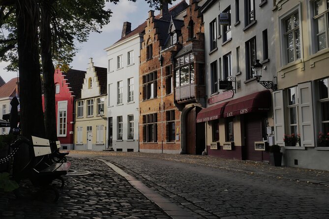 Across Bruges History Equals Fun with chocolate and waffle sample - Basilica of the Holy Blood and the Fish Market from 1821