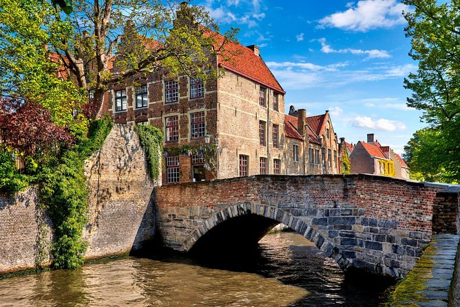 Bruges and Ghent Day Trip from Brussels - Ghent churches, guild buildings, and bridge photos