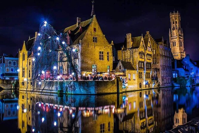 Bruges at Night: Murder, Mystery & Dark Stories Small Group Walk - Belfry area first stop: medieval power, seen from the outside