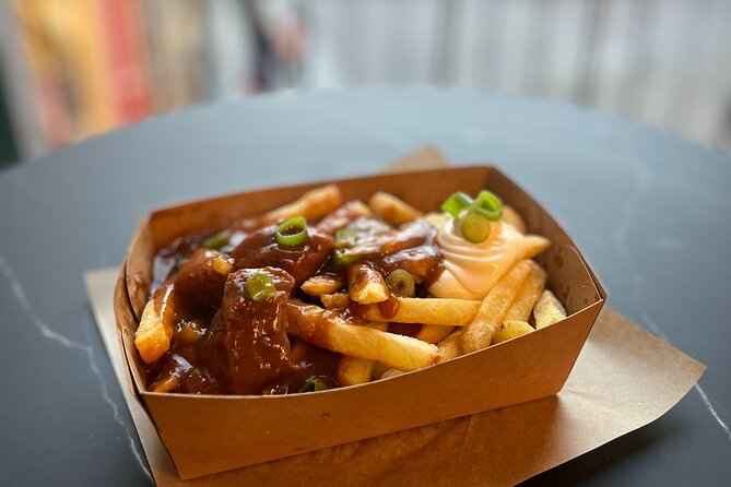 Bruges Food Tour with Full Meal & Drinks by Do Eat Better - Belfort and the Flemish beef stew with Belgian fries