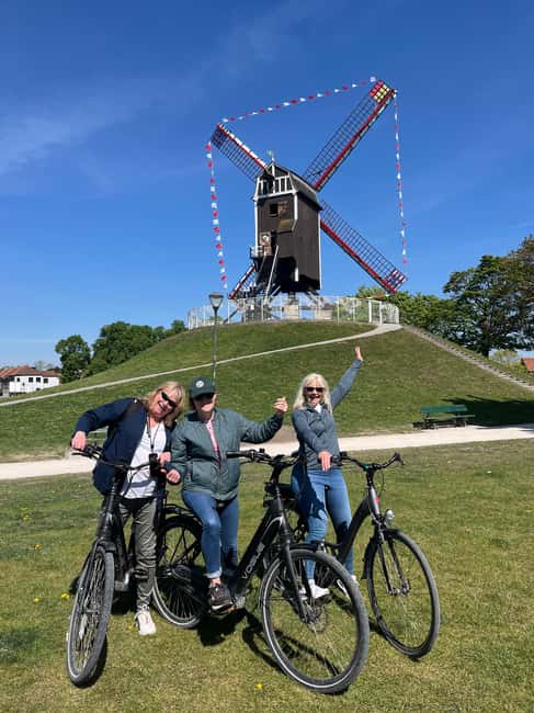 Bruges: Guided Bike Tour with a Local to Sights & Secrets - Market Square, Belfry, and Church of Our Lady at bike-speed