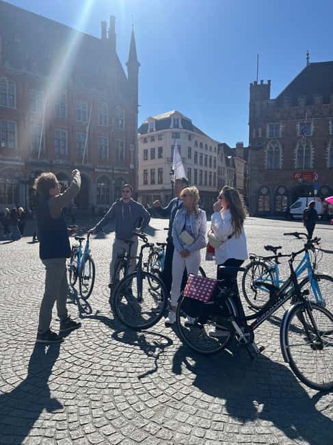 Bruges: Guided Bike Tour with a Local to Sights & Secrets - Canals, windmills, and cobblestone streets you actually feel
