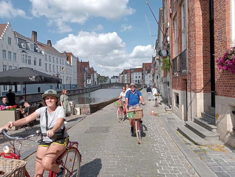 Bruges: Guided Retro Bike Tour of Highlights and Hidden Gems - Lake of Love (Minnewater) and Windmills of Bruges: the calm breaks