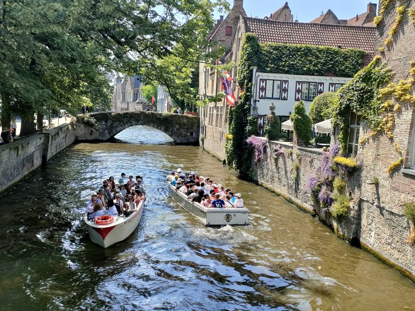 Bruges: Small Group Boat Cruise and Guided Walking Tour - Bonifacius Bridge and Gruuthuse sights for romantic angles