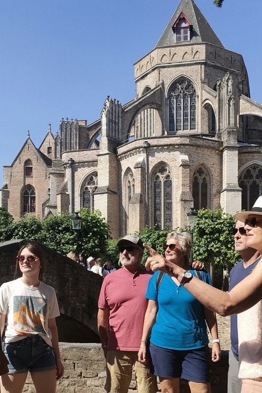 Bruges: Small Group Boat Cruise and Guided Walking Tour - Huidenvettersplein and the charm of the in-between streets
