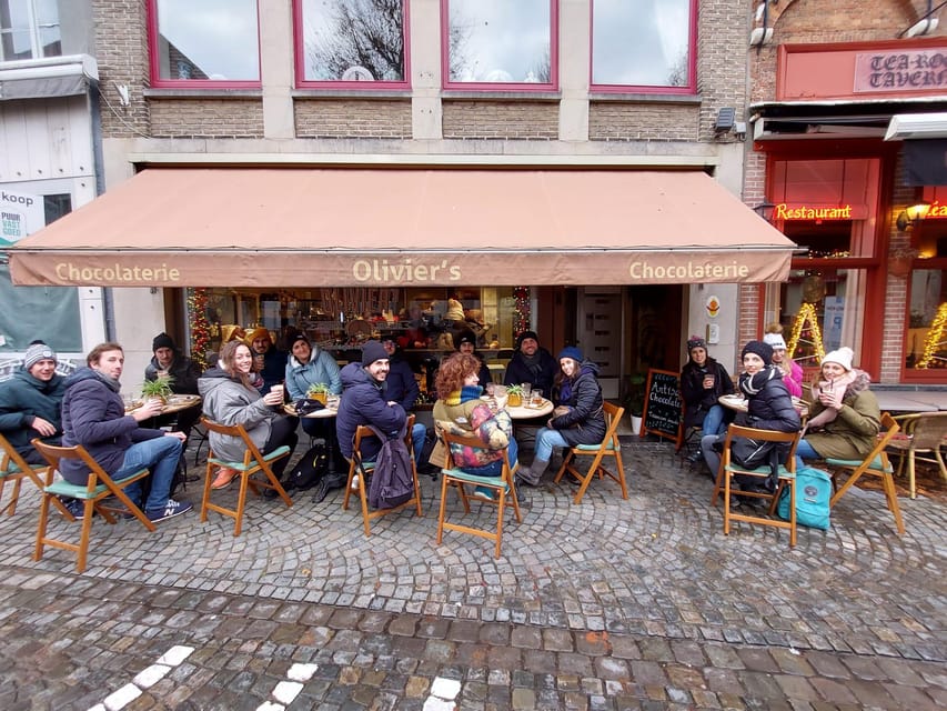 Bruges: Walking Tour with Hot Chocolate & Chocolate Tasting - Markt and Burg Square, where the stories start
