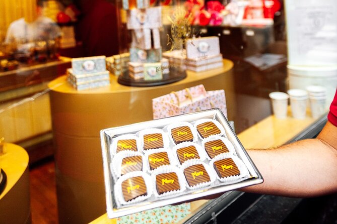 Brussels: Historical Walking Tour with Chocolate & Waffle Tasting - Grand Place symbol spotting: decoding the facades like a local
