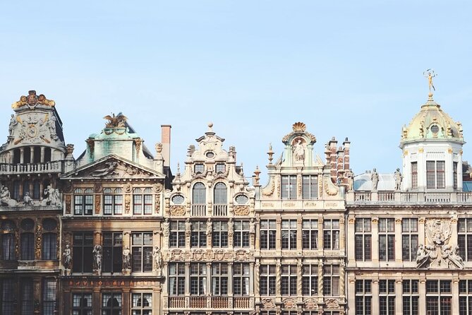 Brussels Old City’s Highlights Walking Tour - Manneken Pis: The 55.5 cm Bronze Statue and Its Costume Collection