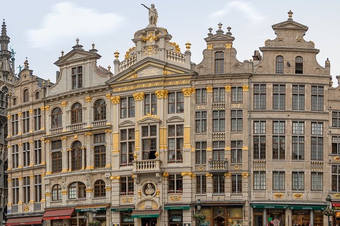 Brussels Private Walking Tour With A Professional Guide - Historic Shop Fronts and Buildings That Withstood Two World Wars