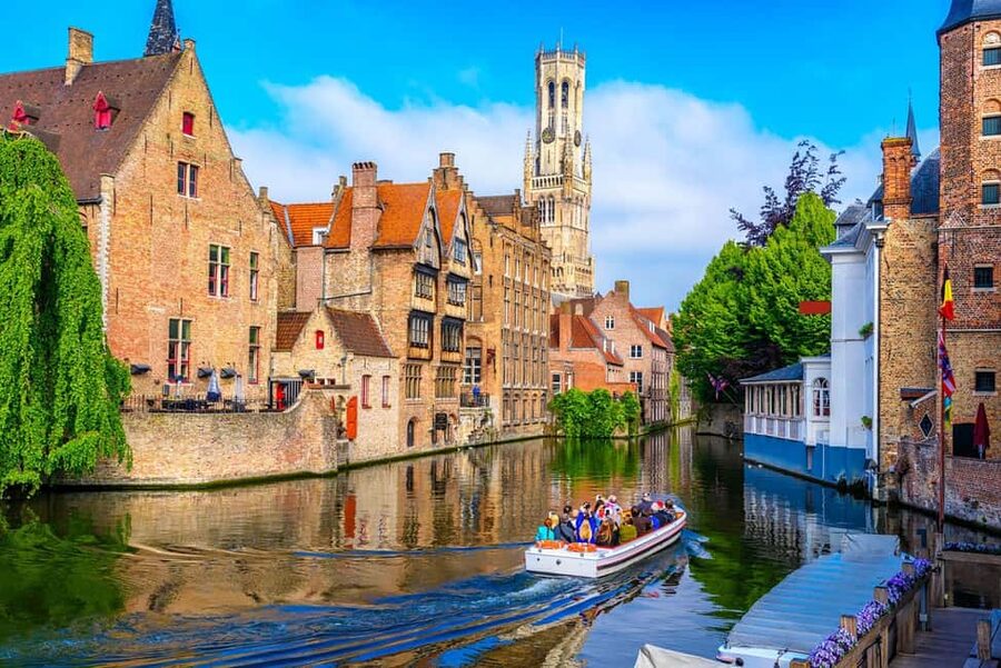 From Amsterdam: Bruges Day Tour in Spanish or English - Getting there from Amsterdam Central: Ruijterkade 34A and a long coach day