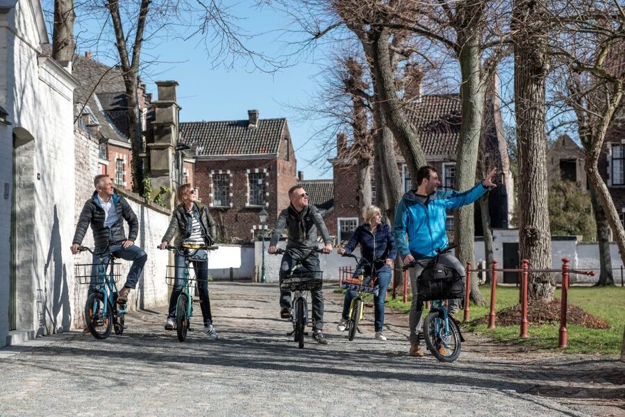 Ghent: City Highlights and Hidden Gems Guided Bike Tour - The ride, the meeting point, and what 150 minutes really means