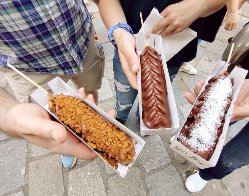 Ghent: Guided City Tour with Chocolate Tastings - The chocolate backstory, from World Expo links to Greek brothers