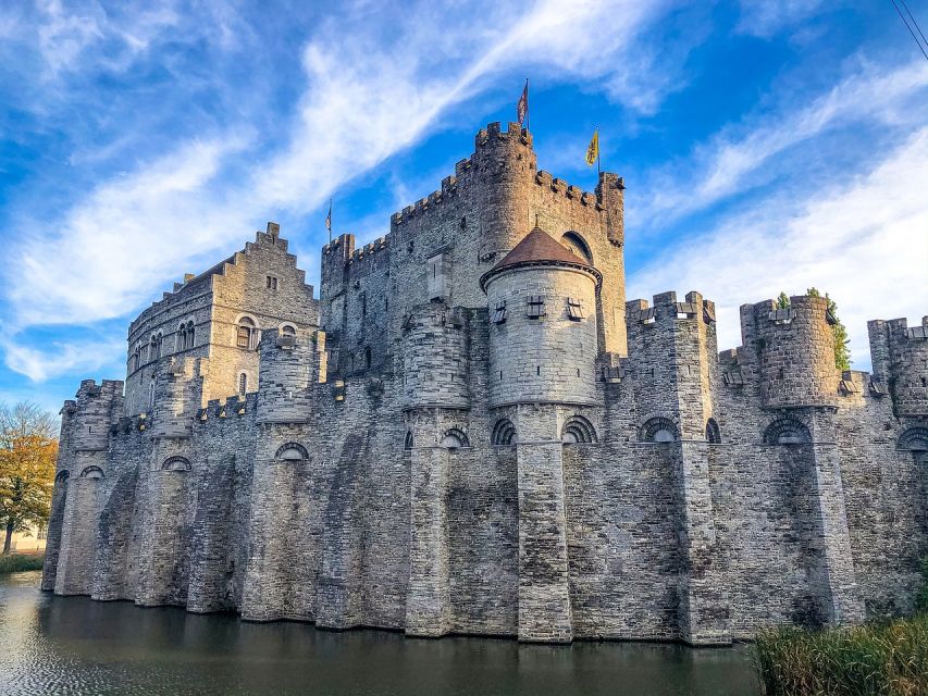 Ghent: Guided Walking Tour and Canal Boat Trip - Graslei, herb and grain trading, and the markets that ran the city