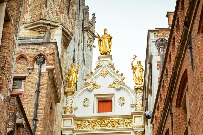 Guided Bruges Tour Canal Cruise with chocolate and Burger - Praline tasting at one of Bruges’ finest chocolatiers