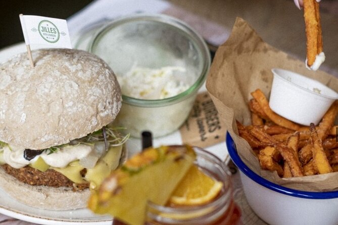 Guided Bruges Tour Canal Cruise with chocolate and Burger - The burger and drink finale: a meal that ends the loop