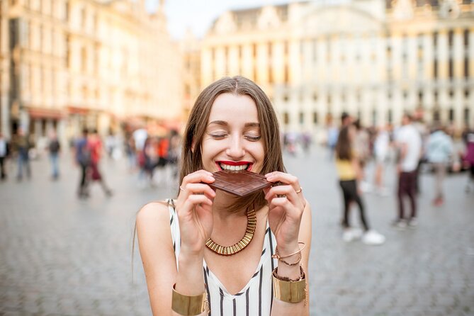 Private Bruges’ Iconic Sites and Chocolate Tasting Tour - Market Square and the Belfry area, where Bruges clicks