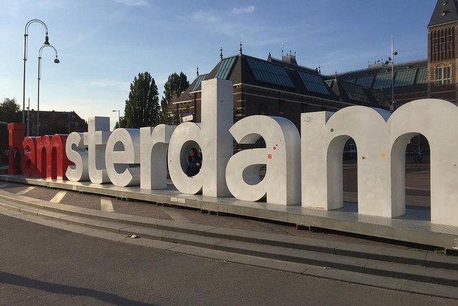 Private taxi Transfer from Bruges to Amsterdam - Pickup in Bruges: Hotel Reception, Luggage Help, and a Real Professional