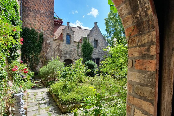 Private tour: From your hotel + see the Madonna of Michelangelo - Ten Wijngaarde Beguinage: a quiet oasis shaped by spiritual life