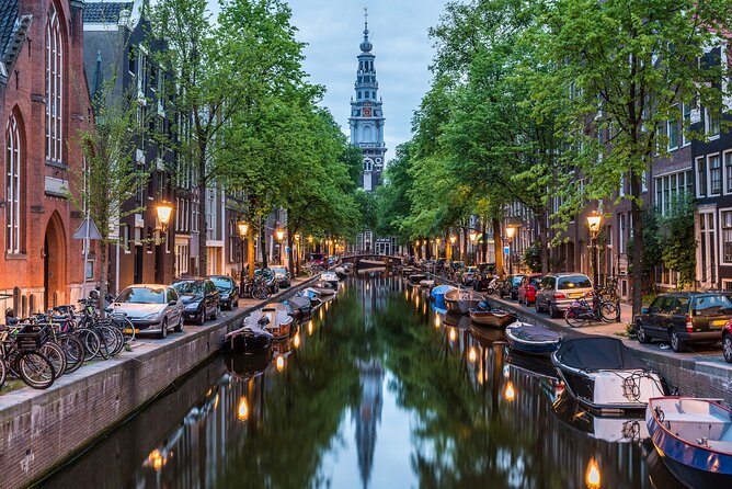 Private transfer from Bruges to Amsterdam, 2h Stop in Antwerp - The driver experience: local tips without the tour-guide pressure