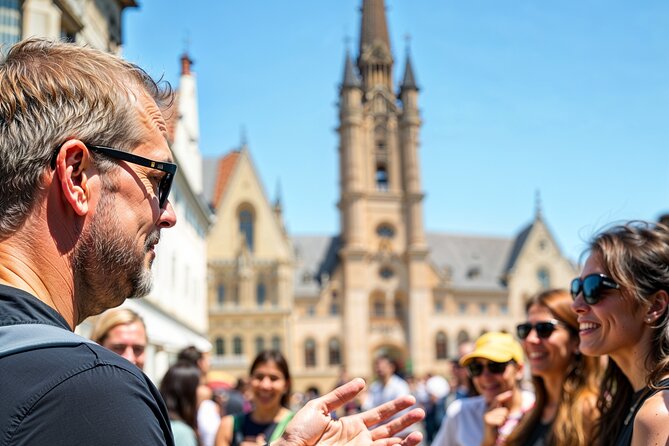 Secrets of Bruges: Walking Tour With a Chocolate and Waffle Bite - Starting at Markt: Belfort Tower views and the Bruges you can navigate