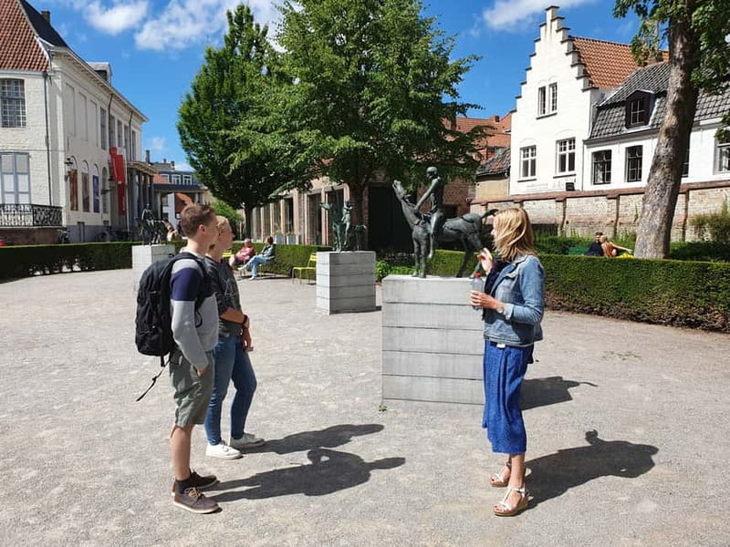 Thé best chocolate in Bruges! Private tour! - Vismarkt fish market and the nearby squares: where food culture meets legends